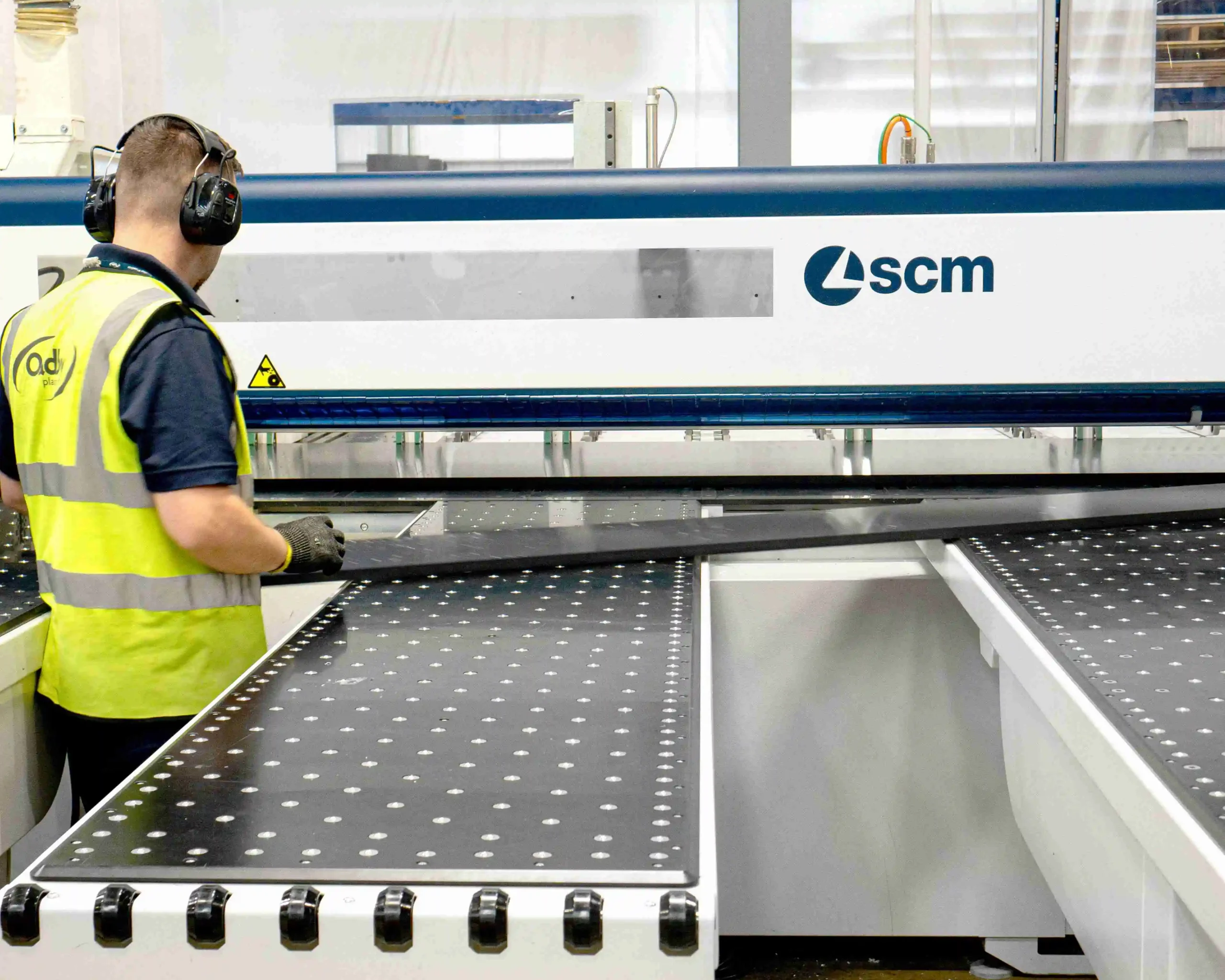 Beam saws at Oadby Plastics with an operator