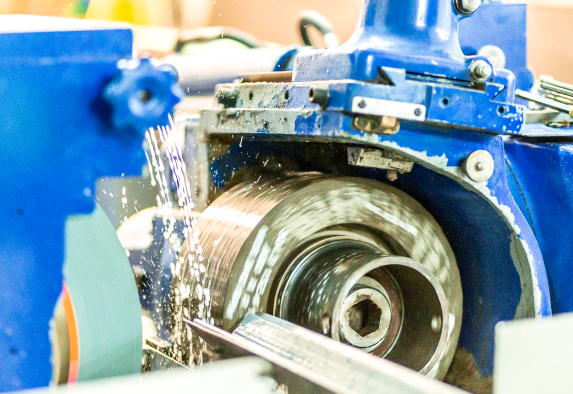 Close-up of a grinding machine at Oadby Plastics