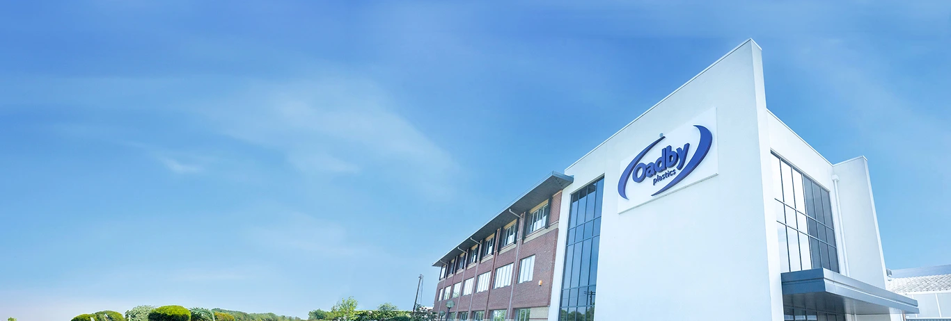 Oadby Plastics Head Office in Leicester with blue skies