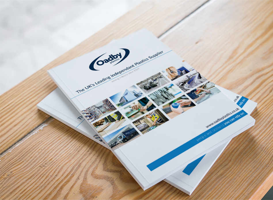 A range of Oadby Plastics brochures laid out on a wooden bench