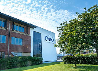 Oadby Plastics head office building with green grass and tree