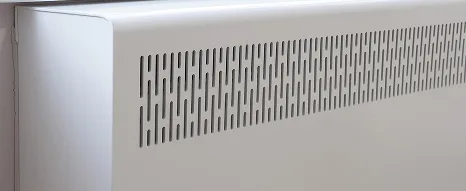 A close up of a PVC radiator cover that is low surface temperature and impact resistant with small grates for maximum airflow